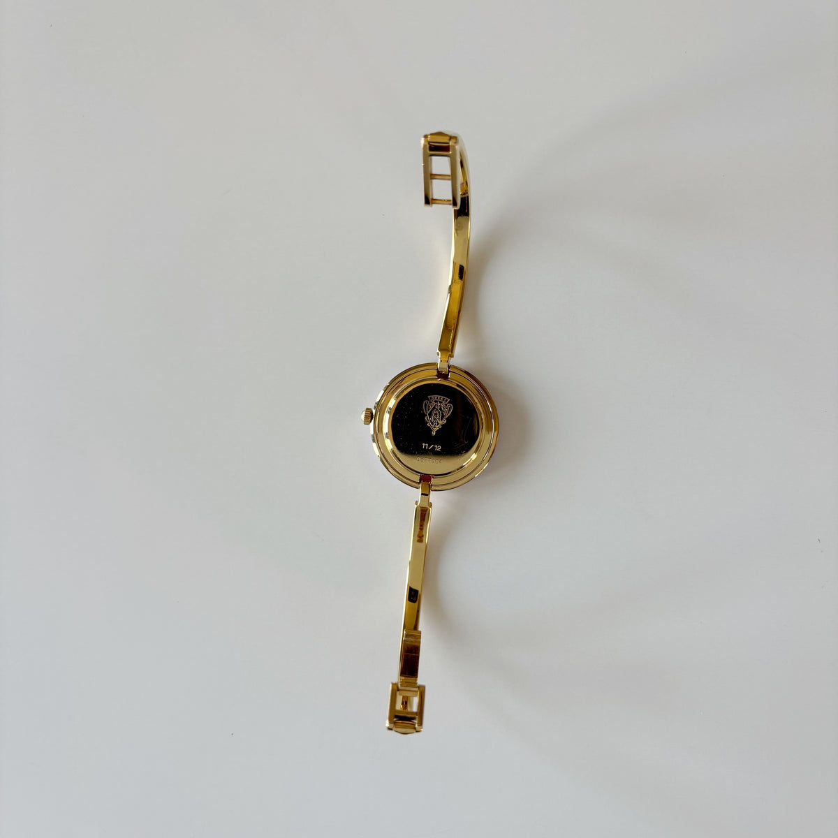 Gucci 1990s Interchangeable Bezel Gold Plated Bangle Watch with 12 bezels, case
