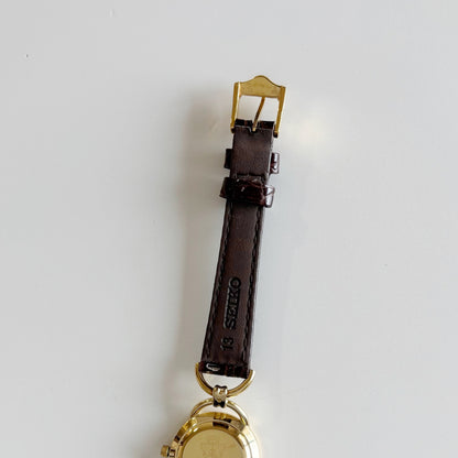 Gucci 1990s Gold Round Dial Horsebit Gold Plated Watch