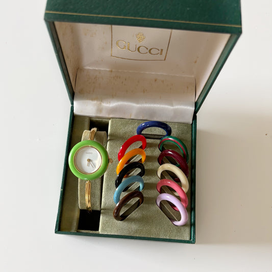 Gucci 1990s Interchangeable Bezel Gold Plated Bangle Watch with 12 bezels, case