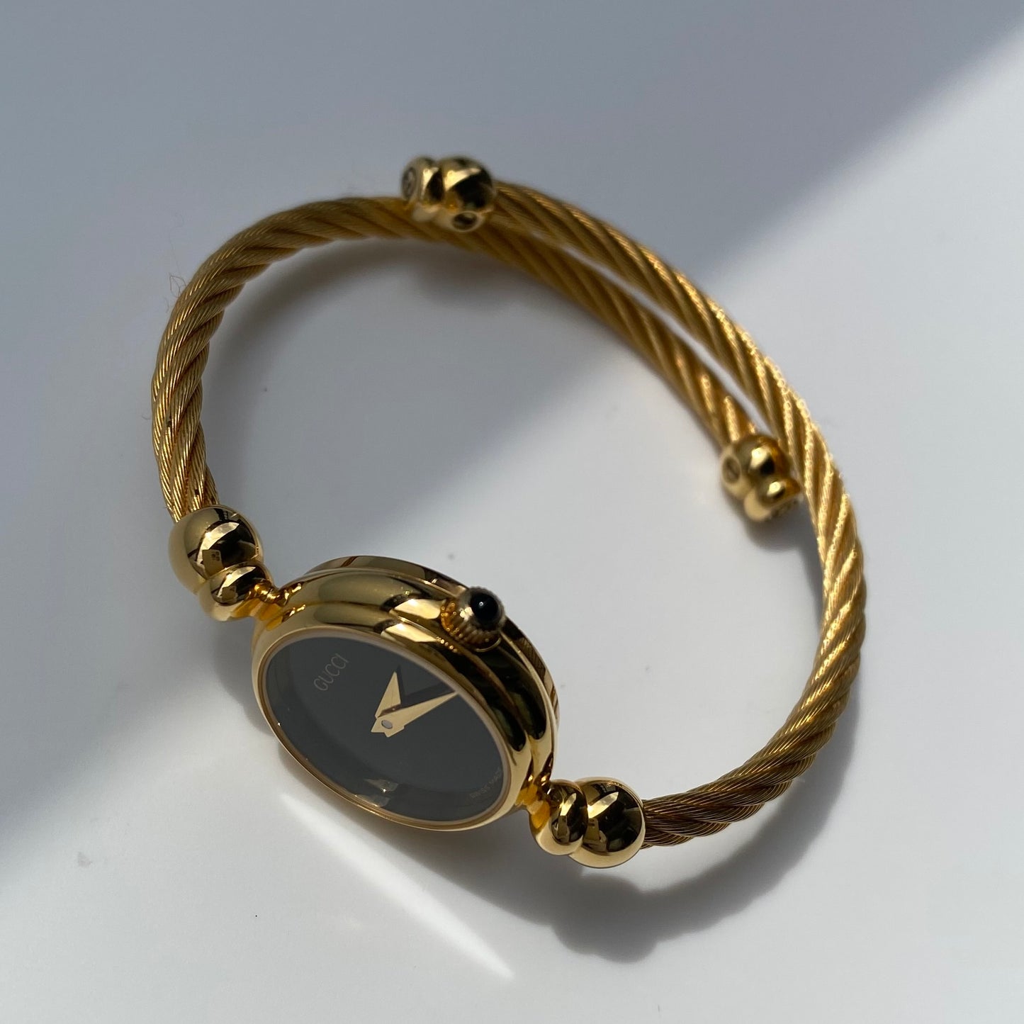Gucci 1990s Black Dial Gold Plated Cable Bangle Watch