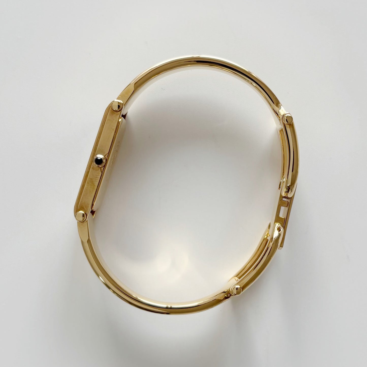 Gucci 1990s Rectangular Black Dial Gold Plated Bangle Watch