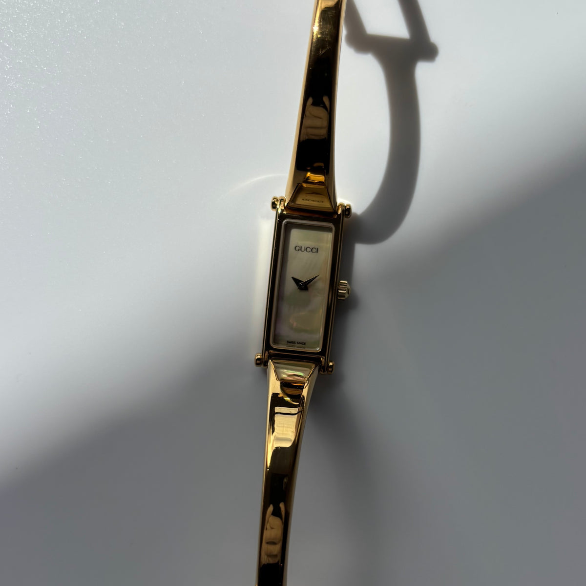 Gucci 1990s Seashell Rectangular Dial Gold Plated Bangle Watch