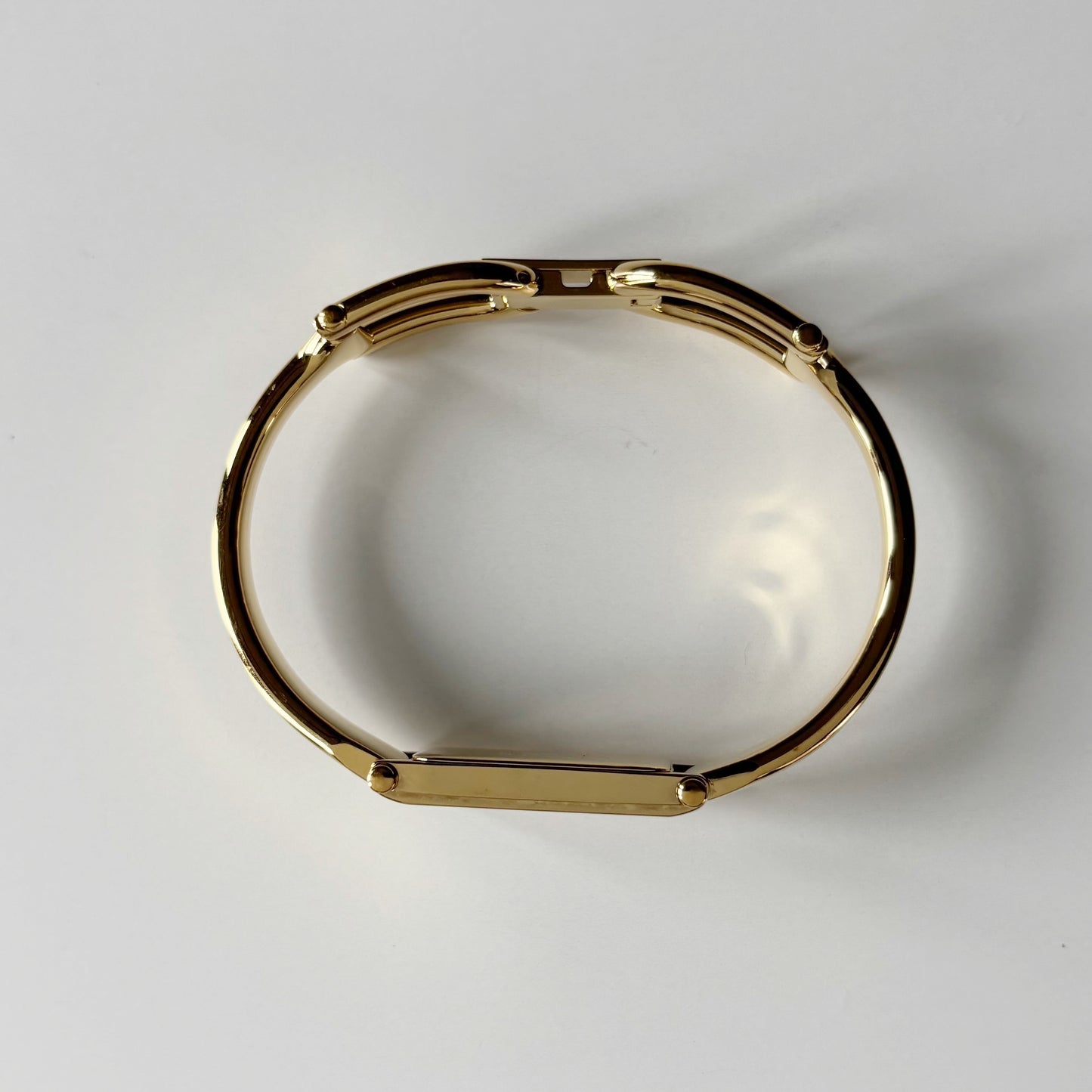 Gucci 1990s Gold Rectangular Dial Gold Plated Bangle Watch