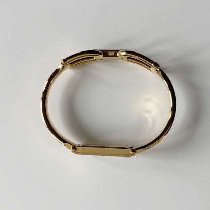 Gucci 1990s Gold Rectangular Dial Gold Plated Bangle Watch