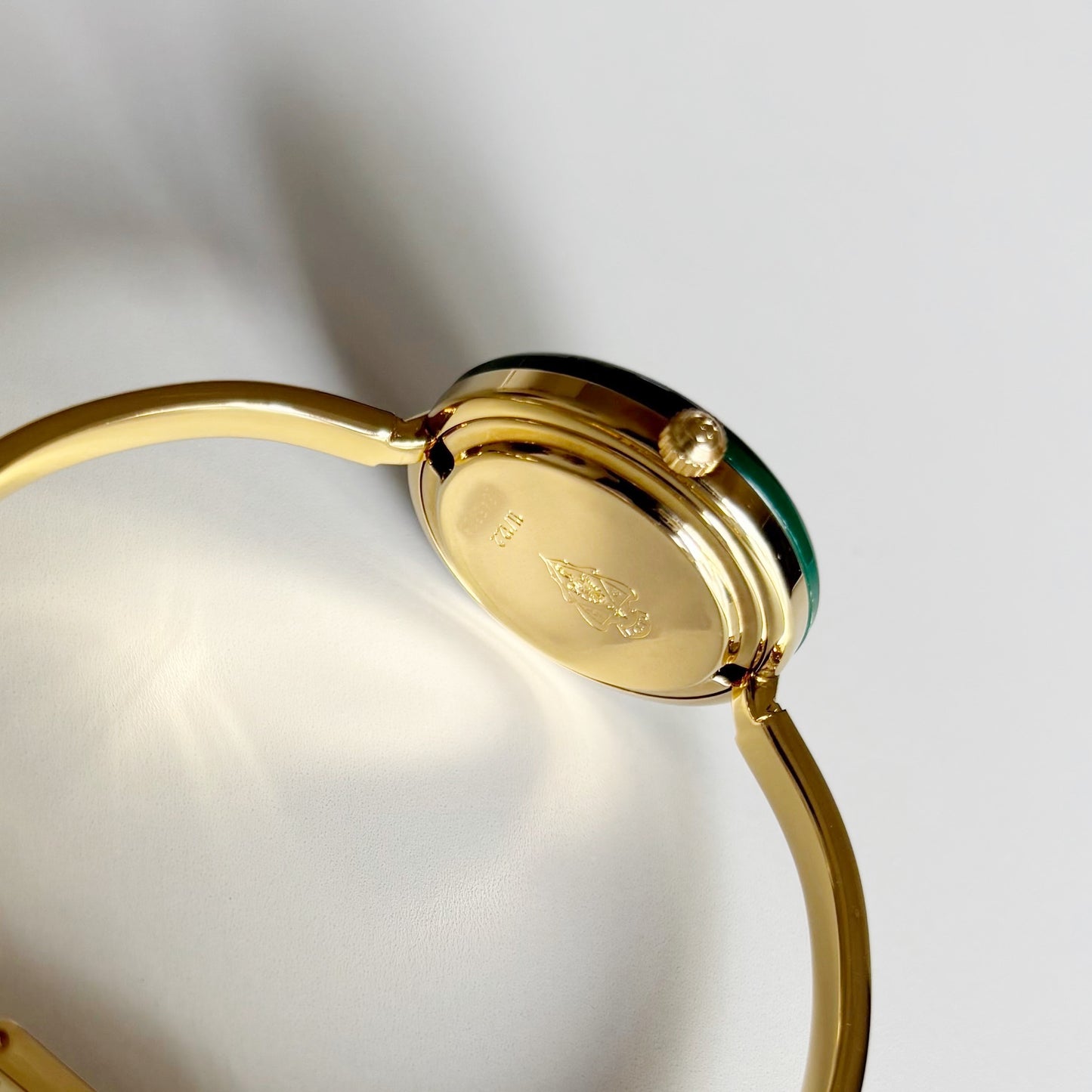 Gucci 1990s Interchangeable Bezel Gold Plated Bangle Watch with 12 bezels, case