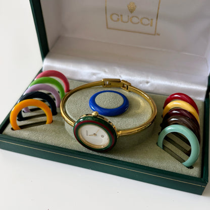 Gucci 1990s Interchangeable Bezel Gold Plated Bangle Watch with 12 bezels, case