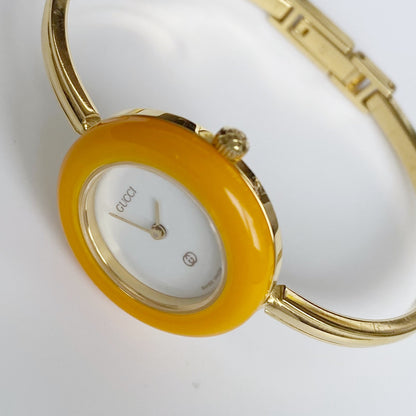 Gucci 1990s Interchangeable Bezel Gold Plated Bangle Watch with 12 bezels, Case