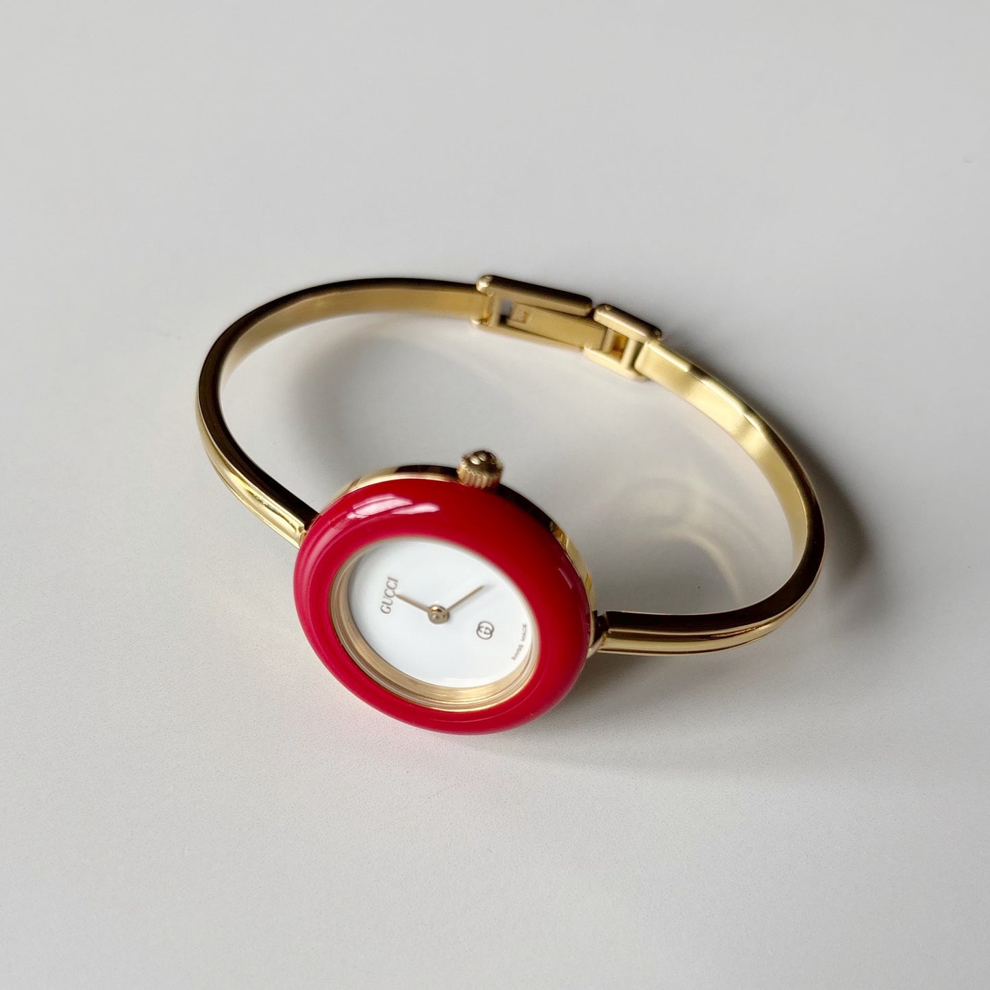 Gucci 1990s Interchangeable Bezel Gold Plated Bangle Watch with 12 bezels, case