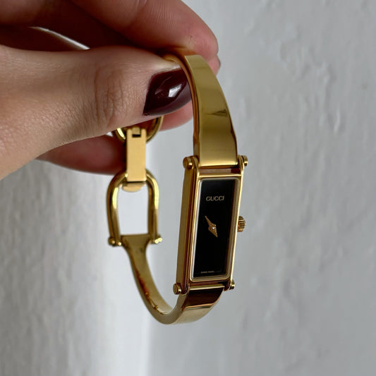 Gucci 1990s Gold Plated Black Rectangular Bangle Watch