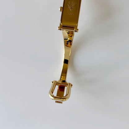 Gucci 1990s Seashell Rectangular Dial Gold Plated Bangle Watch