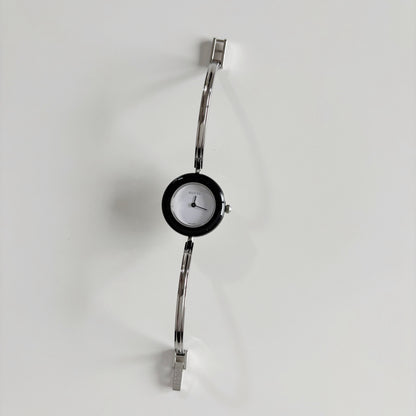 Gucci 1990s Interchangeable Bezel Stainless steel Bangle Watch with 12 bezels, case