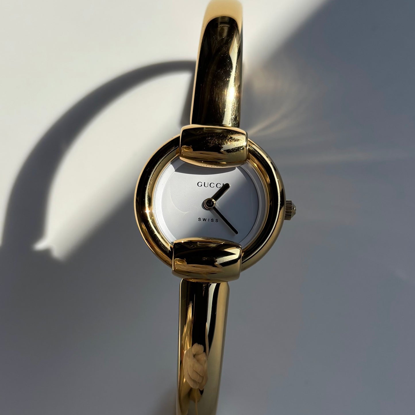 Gucci 1990s Round Dial Gold Plated Bangle Watch (Small)