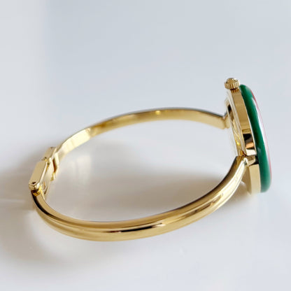 Gucci 1990s Interchangeable Bezel Gold Plated Bangle Watch with 12 bezels, case