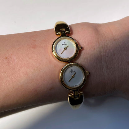 Fendi 1990s Seashell Dial Two Time Zone Gold Plated Bangle Watch