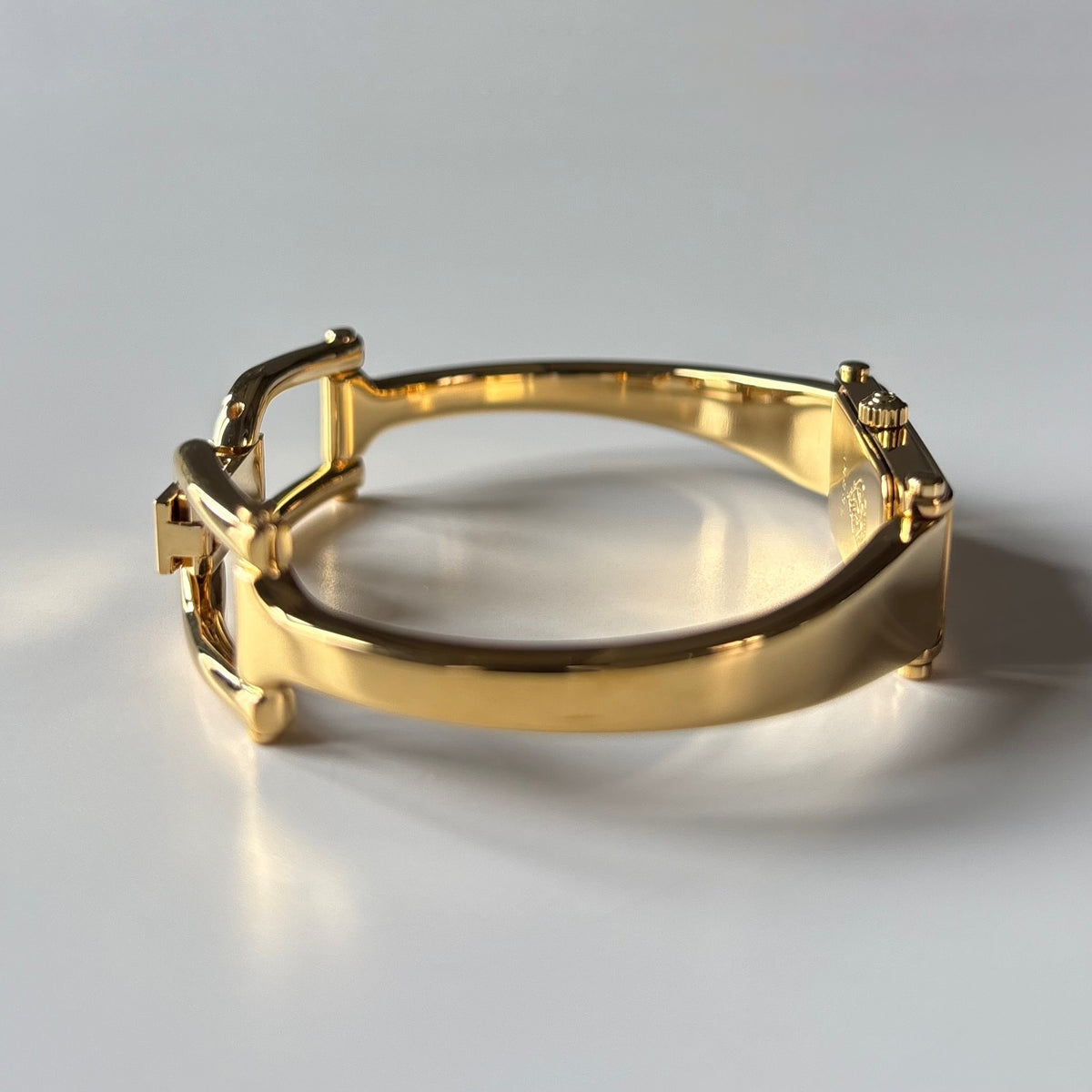 Gucci 1990s Gold Rectangular Dial Gold Plated Bangle Watch