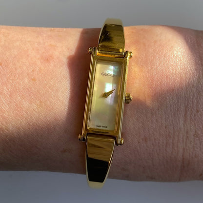 Gucci 1990s Rectangular Seashell Dial Gold Plated Bangle Watch