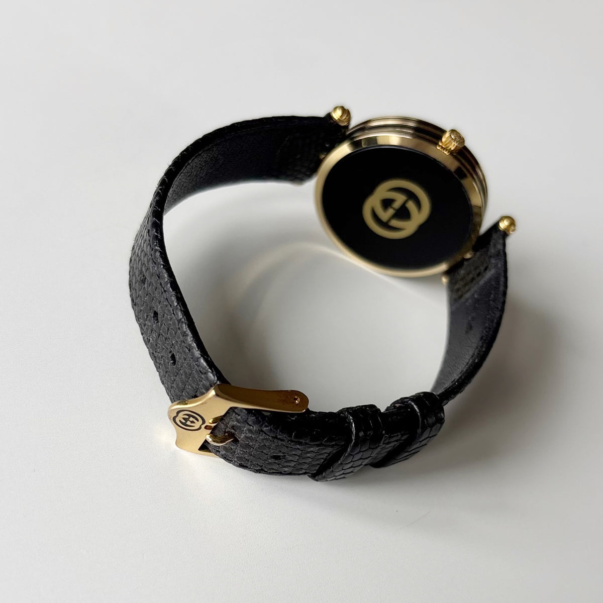 Gucci 1980s Round Black Dial Gold-Plated Watch (Large)