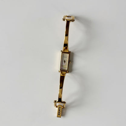 Gucci 1990s Seashell Rectangular Dial Gold Plated Bangle Watch