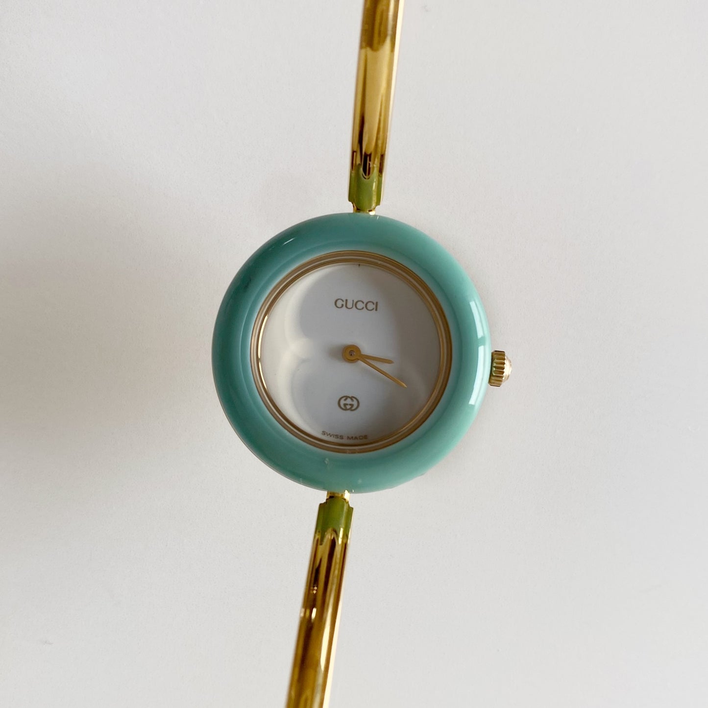 Gucci 1990s Interchangeable Bezel Gold Plated Bangle Watch with 12 bezels, case