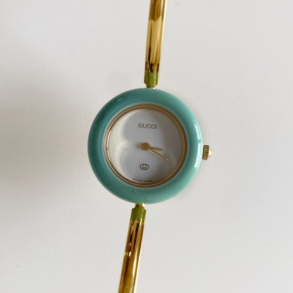 Gucci 1990s Interchangeable Bezel Gold Plated Bangle Watch with 12 bezels, case