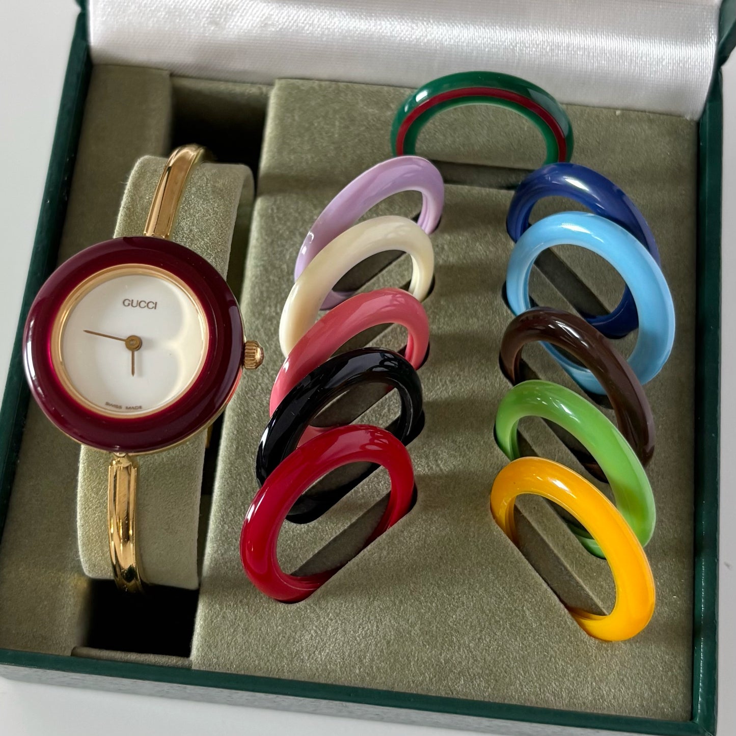 Gucci 1990s Interchangeable Bezel Gold Plated Bangle Watch with 12 bezels, case
