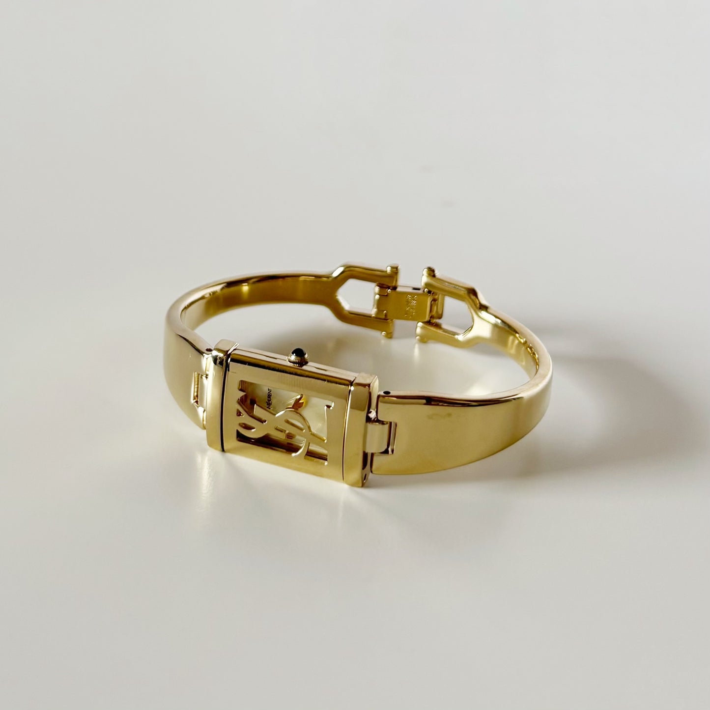Yves Saint Laurent 1990s Peek-A-Boo Gold Plated Bangle Watch