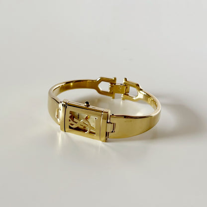Yves Saint Laurent 1990s Peek-A-Boo Gold Plated Bangle Watch