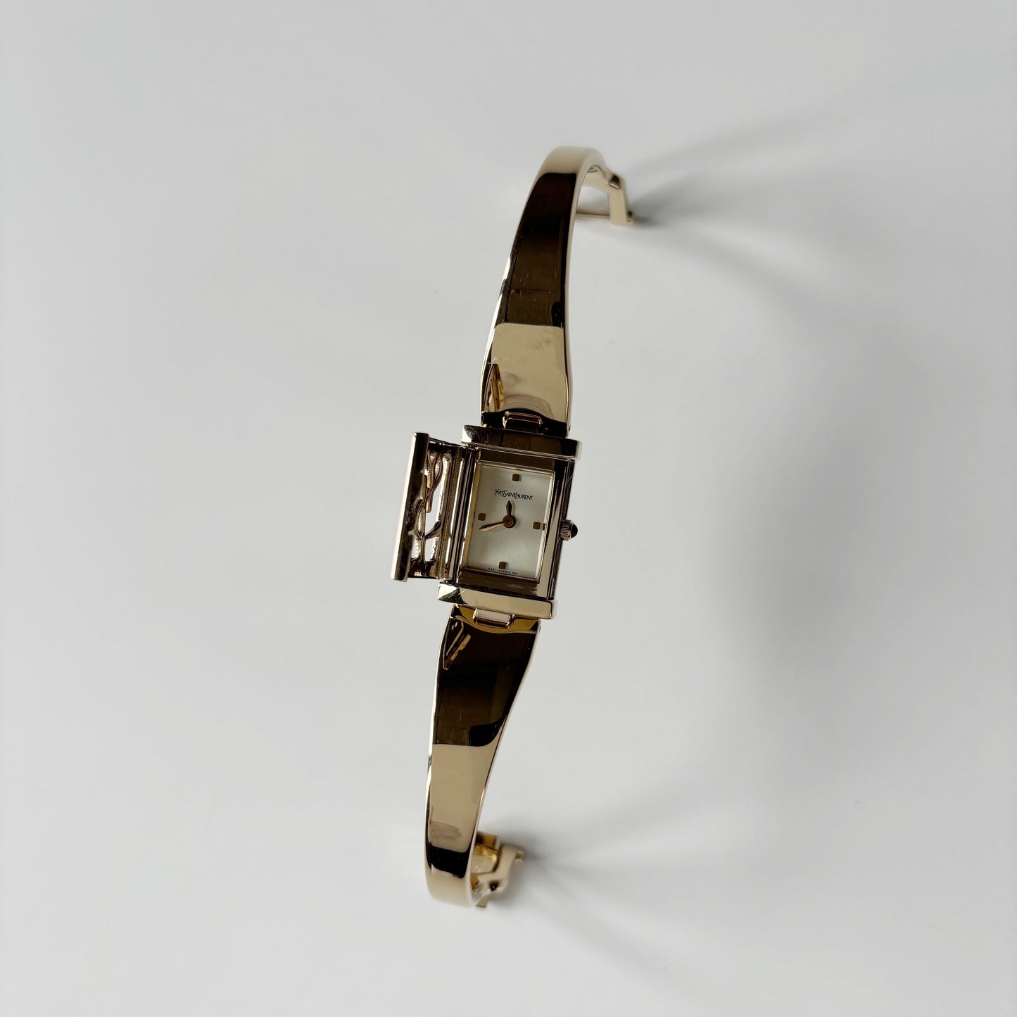 Yves Saint Laurent 1990s Peek-A-Boo Gold Plated Bangle Watch