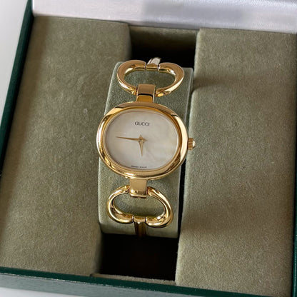 Gucci 1990s Seashell Oval Dial Gold Plated Bangle Watch (Small)