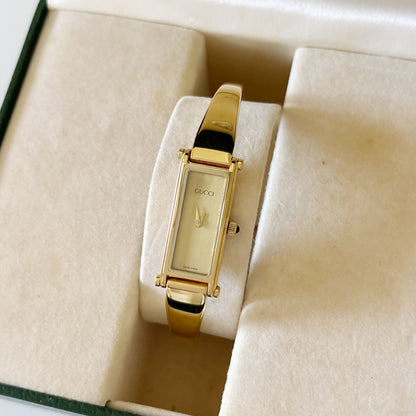 Gucci 1990s Gold Dial Gold Plated Rectangular Bangle Watch