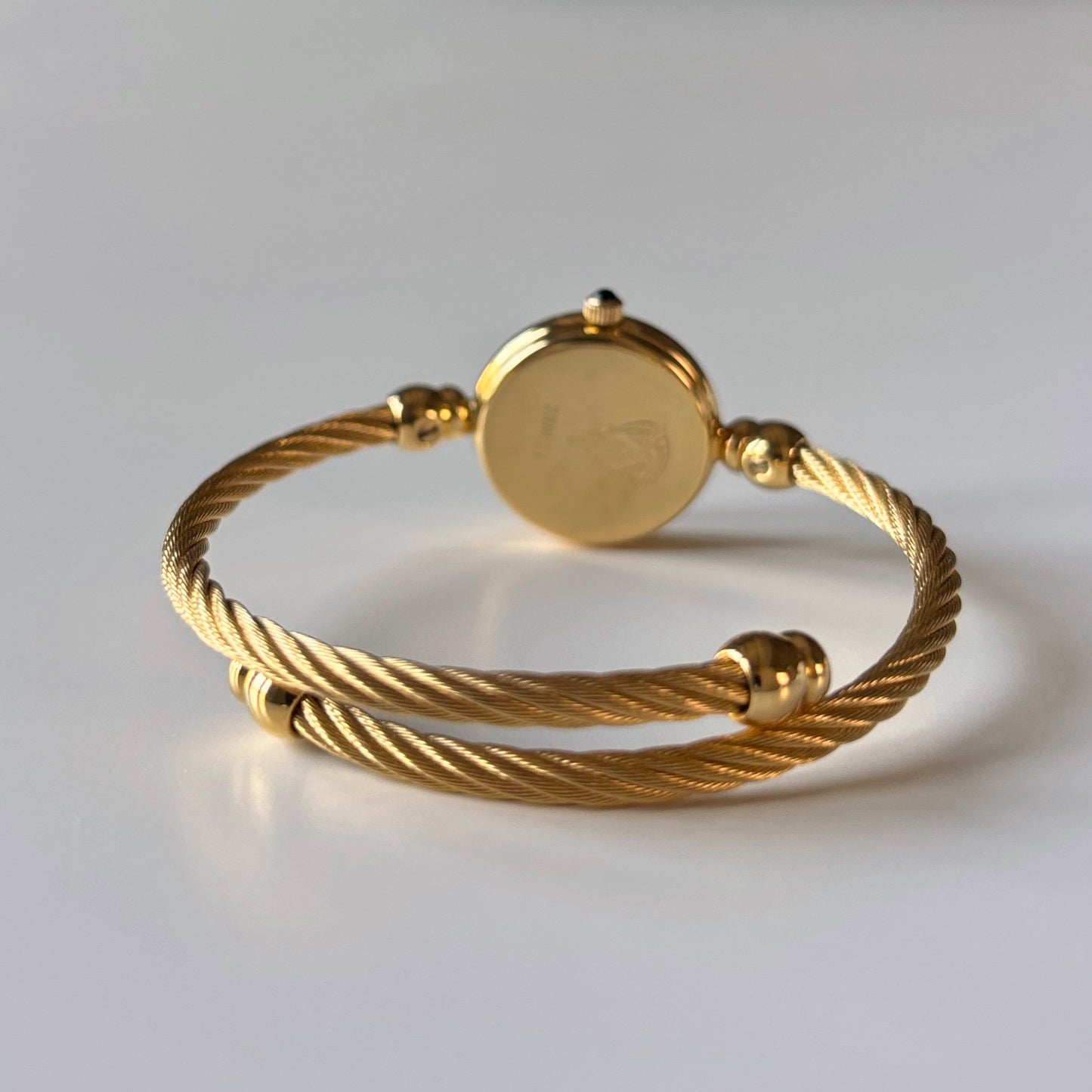 Gucci 1990s Black Dial Gold Plated Cable Bangle Watch