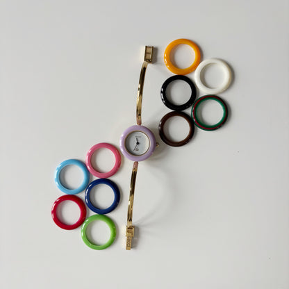 Gucci 1990s Interchangeable Bezel Gold Plated Bangle Watch with 12 bezels, case