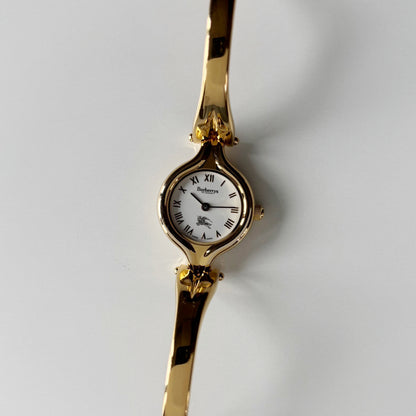 Burberry 1990s Round Dial Gold Plated Bangle Watch