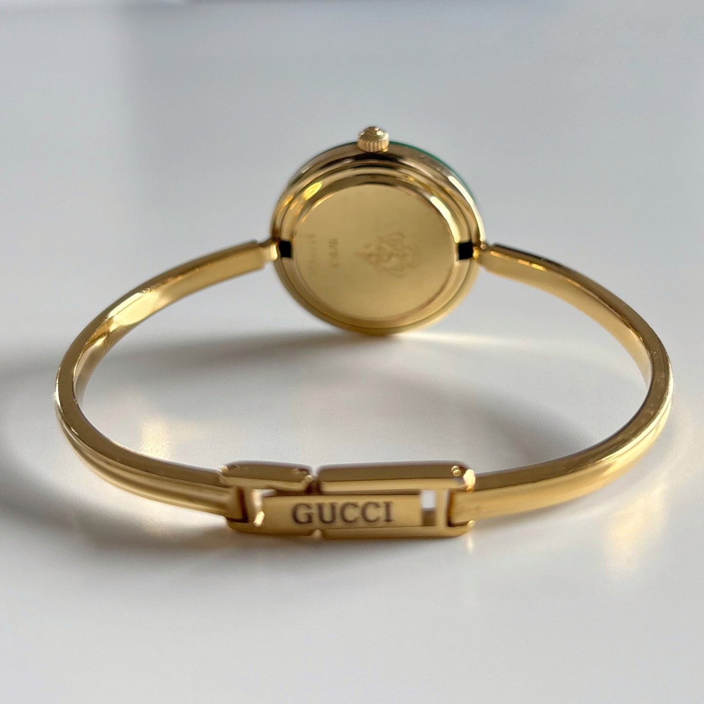 Gucci 1990s Interchangeable Bezel Gold Plated Bangle Watch with 12 bezels, case