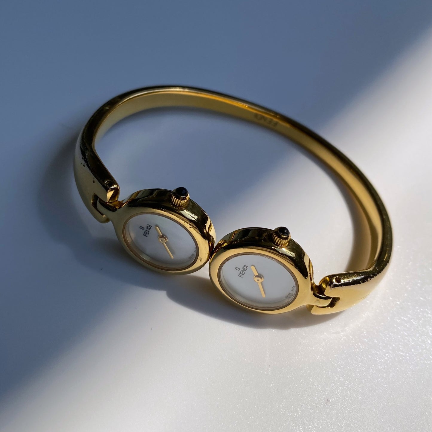 Fendi 1990s Seashell Dial Two Time Zone Gold Plated Bangle Watch