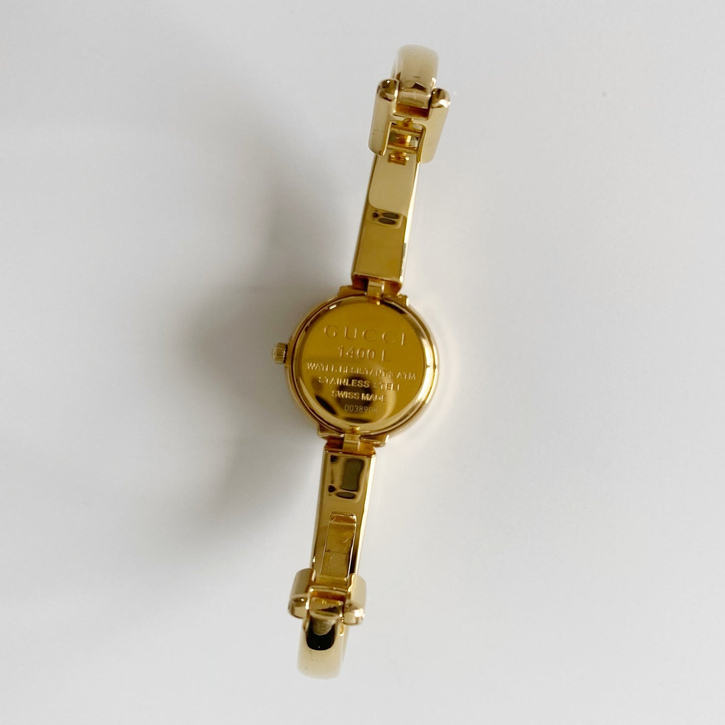 Gucci 1990s Round Dial Gold Plated Bangle Watch