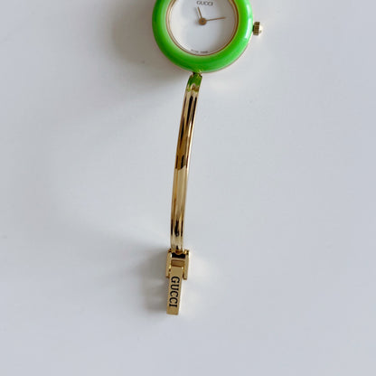 Gucci 1990s Interchangeable Bezel Gold Plated Bangle Watch with 12 bezels, case