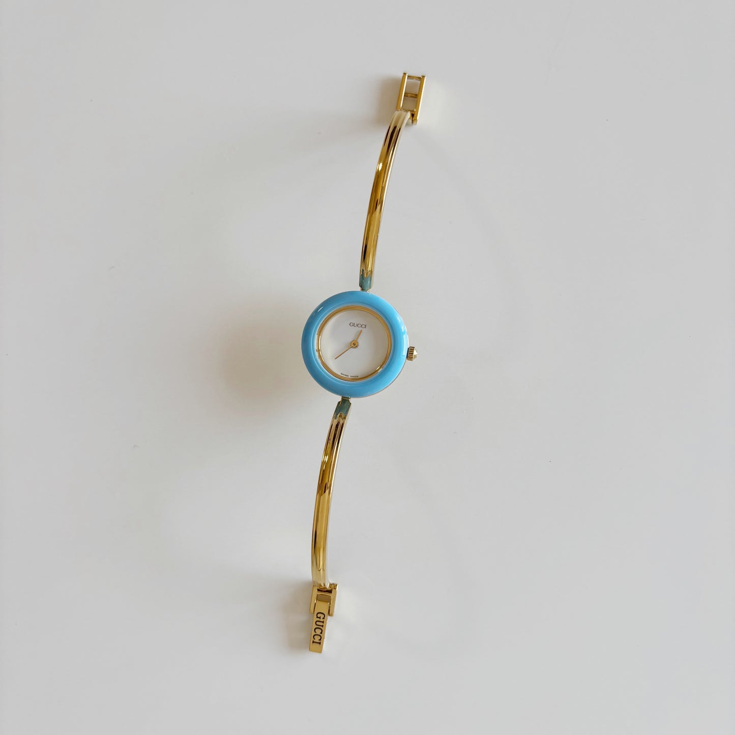 Gucci 1990s Interchangeable Bezel Gold Plated Bangle Watch with 12 bezels, case