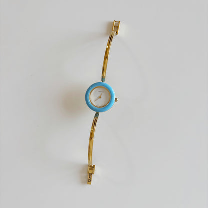 Gucci 1990s Interchangeable Bezel Gold Plated Bangle Watch with 12 bezels, case