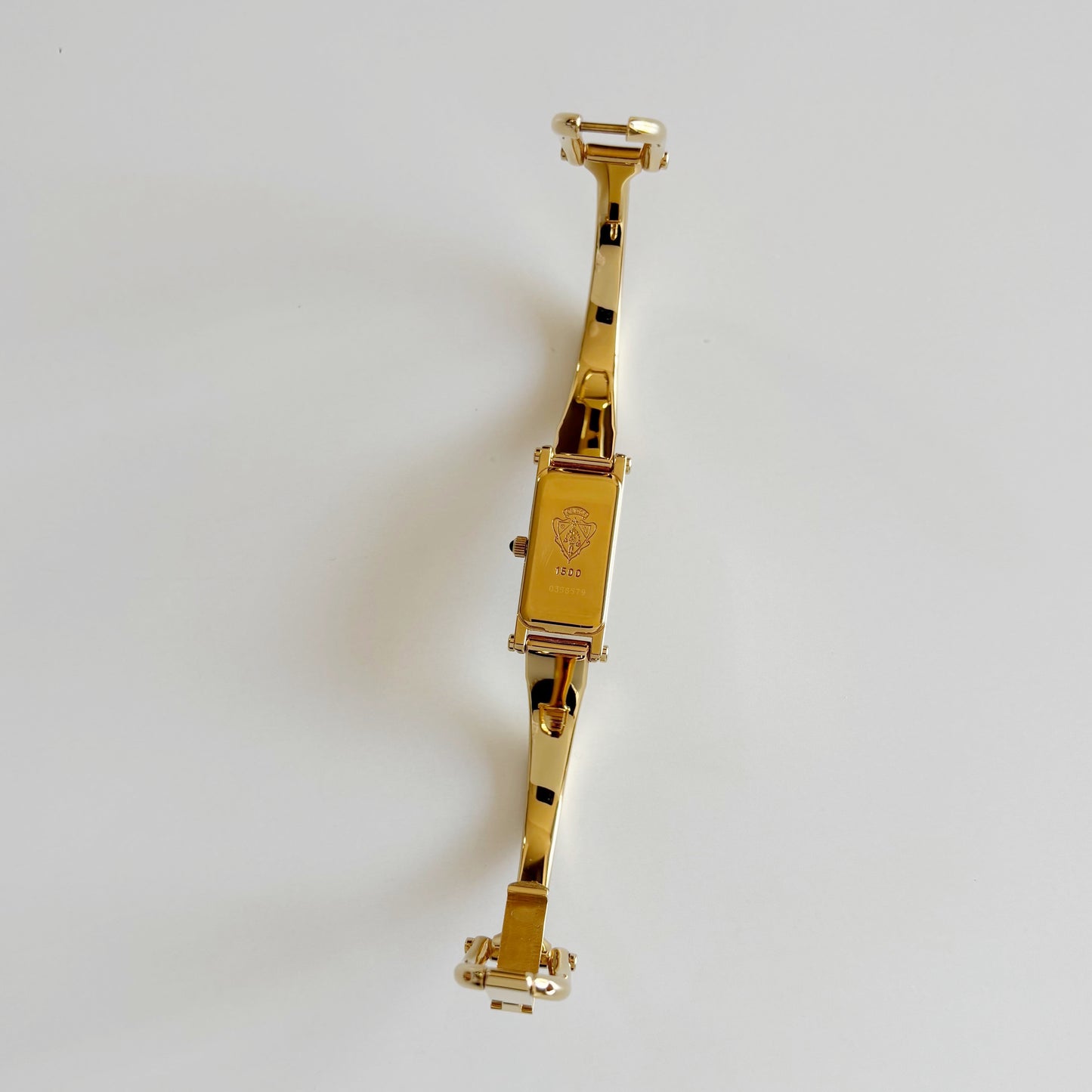 Gucci 1990s Rectangular Dial Gold Plated Bangle Watch