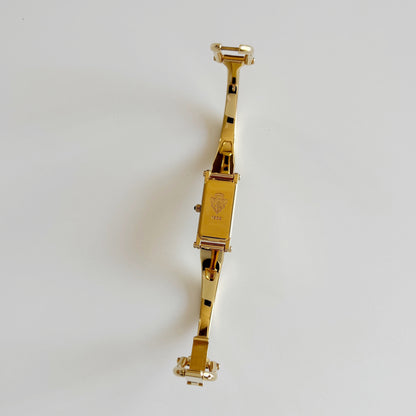 Gucci 1990s Rectangular Dial Gold Plated Bangle Watch