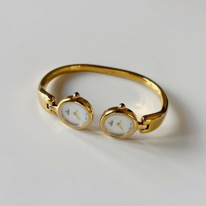 Fendi 1990s Seashell Dial Two Time Zone Gold Plated Bangle Watch