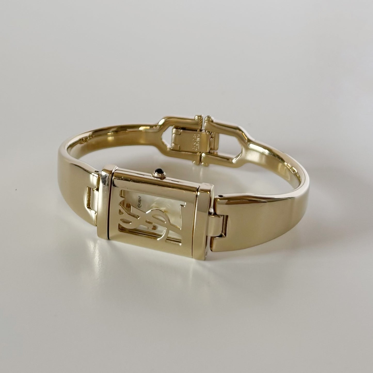 Yves Saint Laurent 1990s Peek a boo Gold Plated Bangle Watch