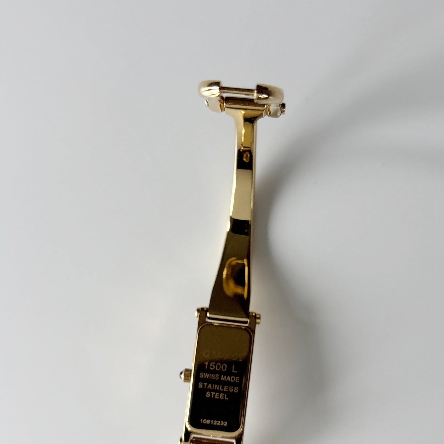 Gucci 1990s Gold Rectangular Dial Gold Plated Bangle Watch