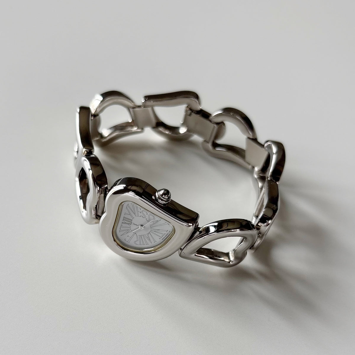 Yves Saint Laurent 1990s Heart Shaped Dial Band Silver Watch
