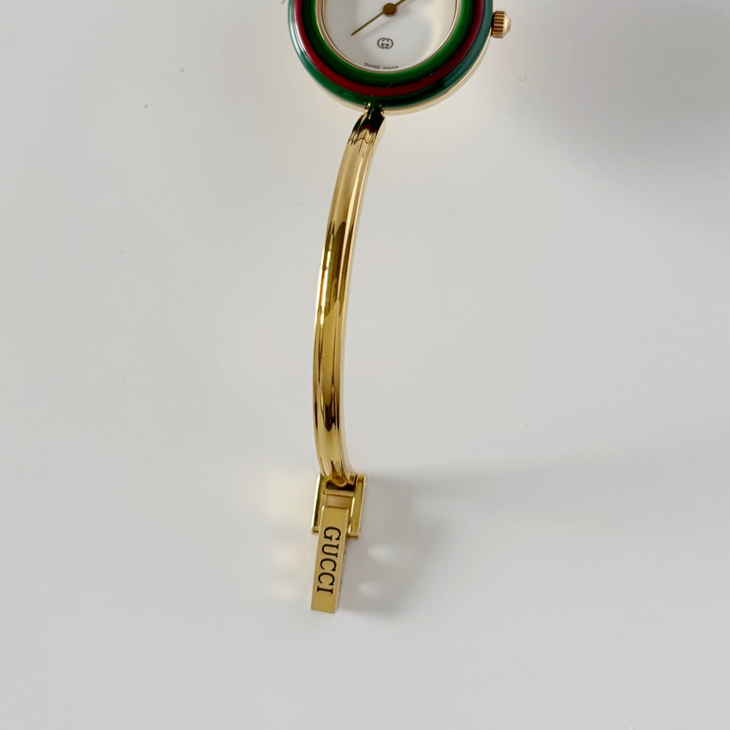 Gucci 1990s Interchangeable Bezel Gold Plated Bangle Watch with 12 bezels, case