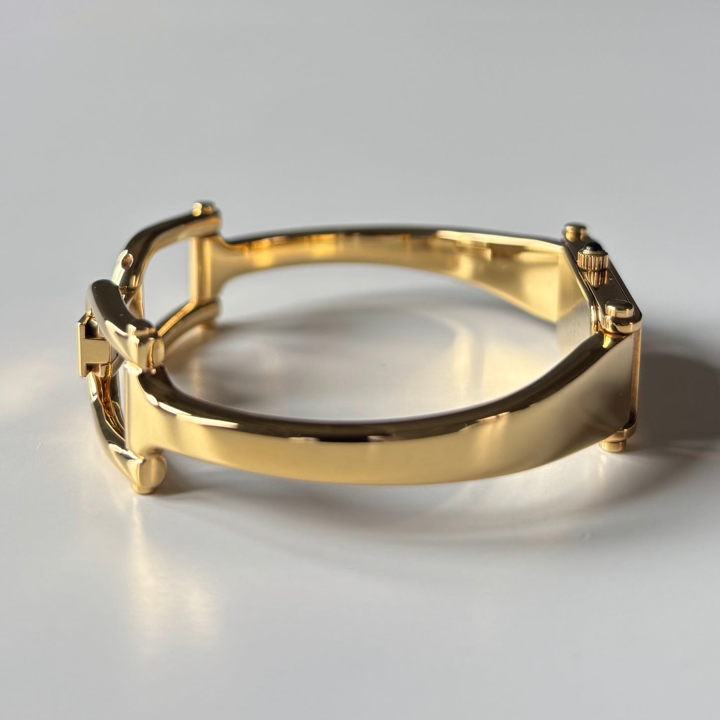 Gucci 1990s Gold Rectangular Dial Gold Plated Bangle Watch