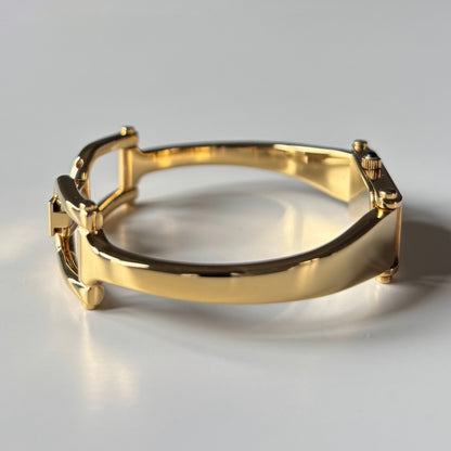 Gucci 1990s Gold Rectangular Dial Gold Plated Bangle Watch