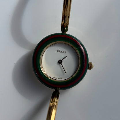 Gucci 1990s Interchangeable Bezel Gold Plated Bangle Watch with 12 bezels, case