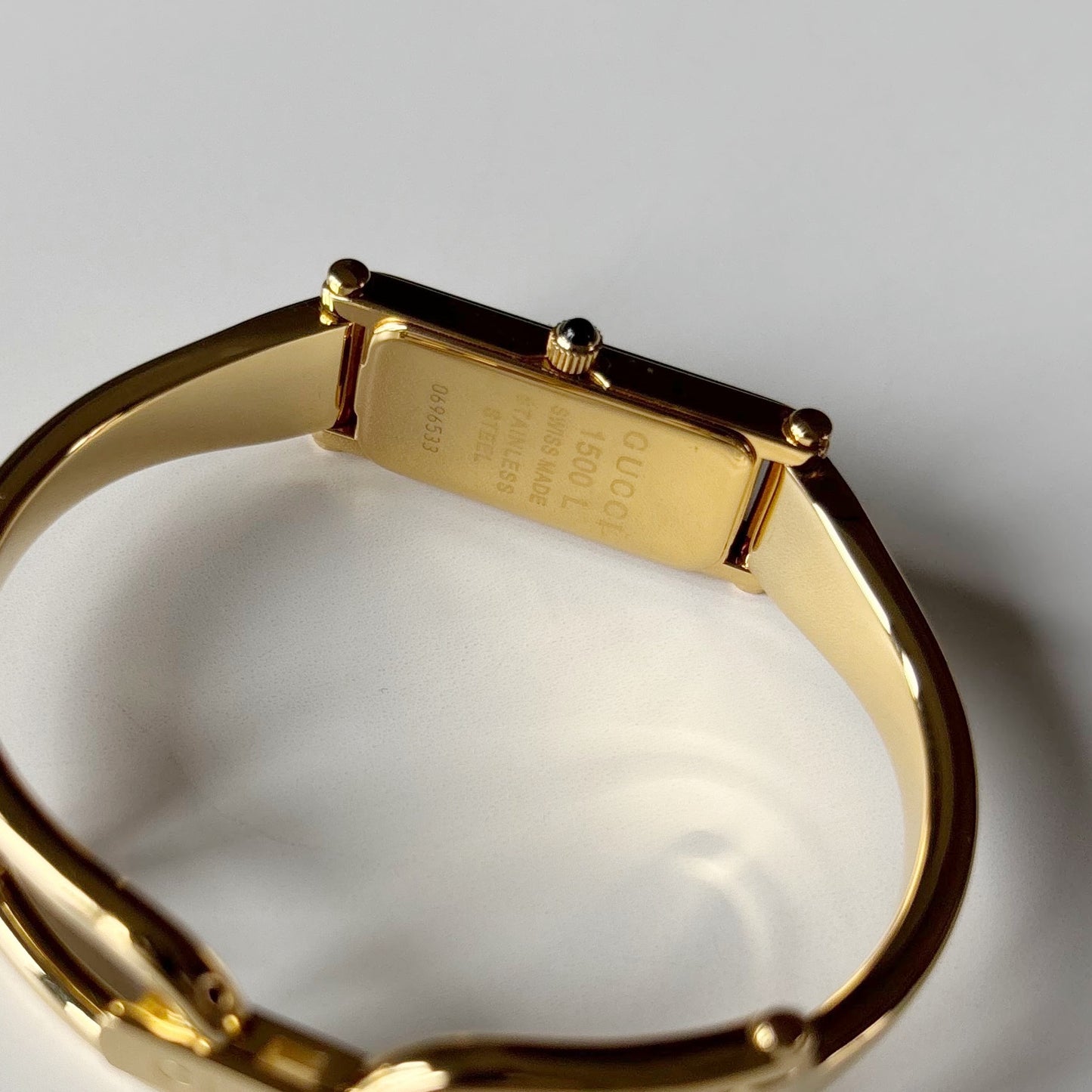 Gucci 1990s Gold Rectangular Dial Gold Plated Bangle Watch (Small)